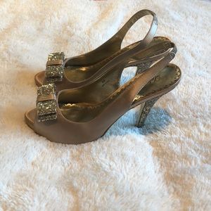 Gold peep-toe high heels!